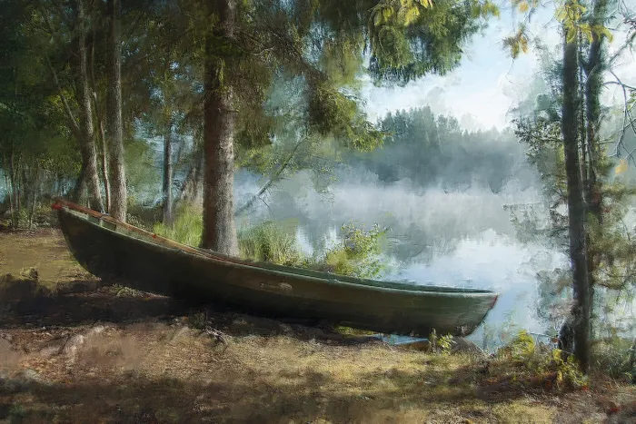 A green wooden boat rests on a shore beside a foggy lake framed by pine trees in soft morning light. | PrintPosters.in