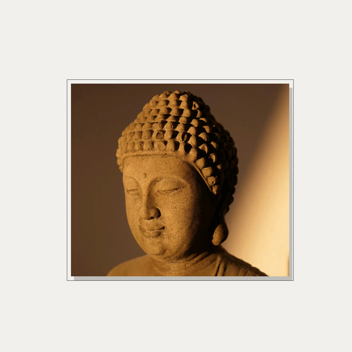 Warm Lit Stone Buddha Head Canvas — floater frame preview | PrintPosters.in