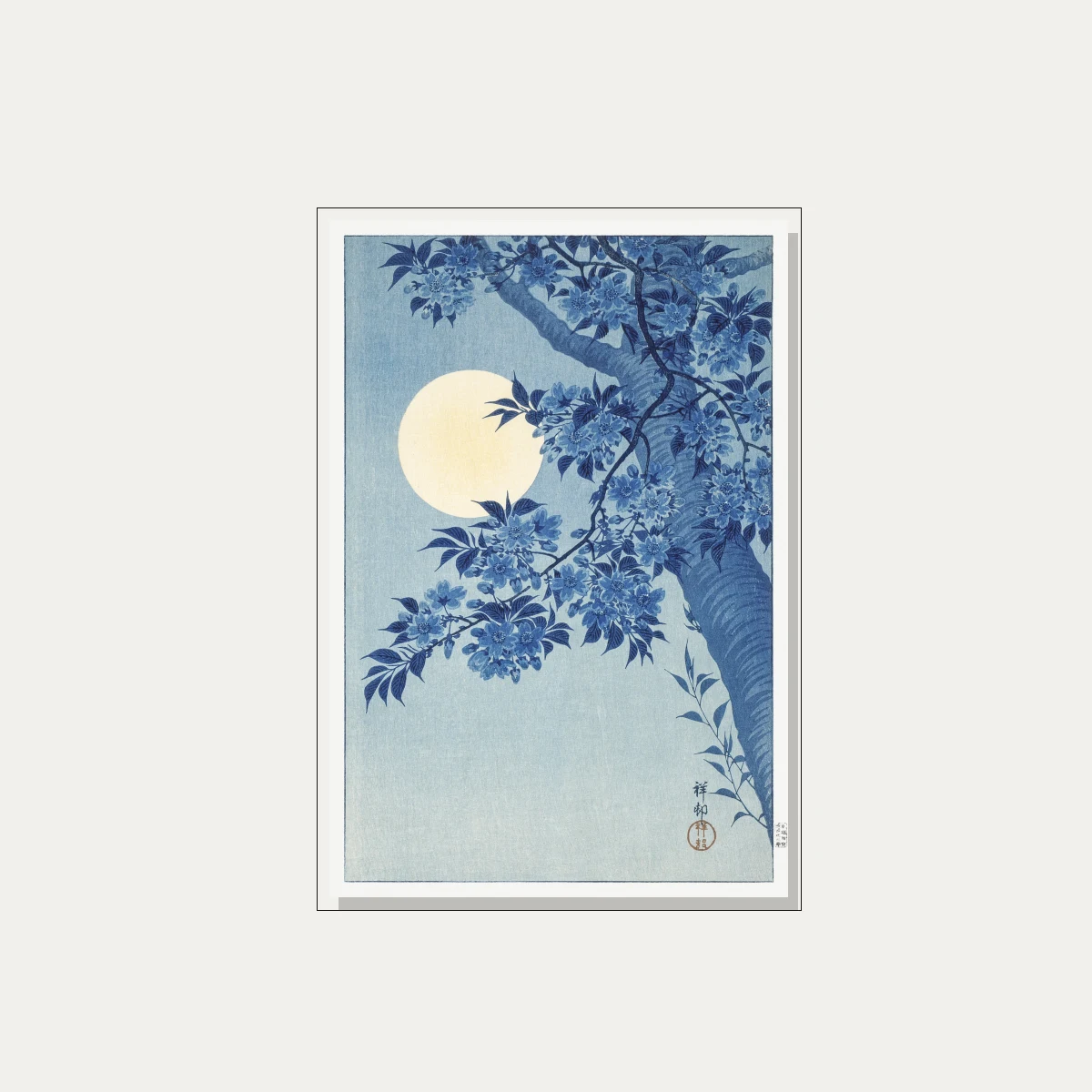 Indigo blue Japanese cherry blossom tree branches under a large glowing pale yellow full moon. — floater frame preview | PrintPosters.in