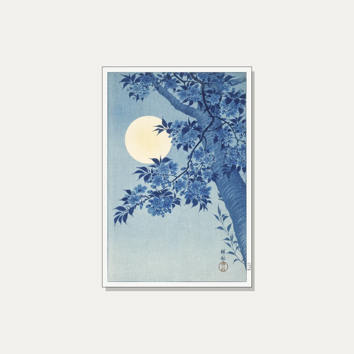 Indigo blue Japanese cherry blossom tree branches under a large glowing pale yellow full moon. | PrintPosters.in