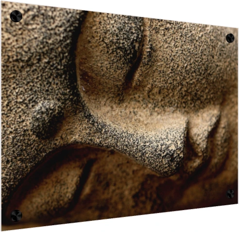 Extreme close-up of a textured stone sculpture of Lord Buddha's serene face, showing his closed eye and nose. — acrylic preview | PrintPosters.in