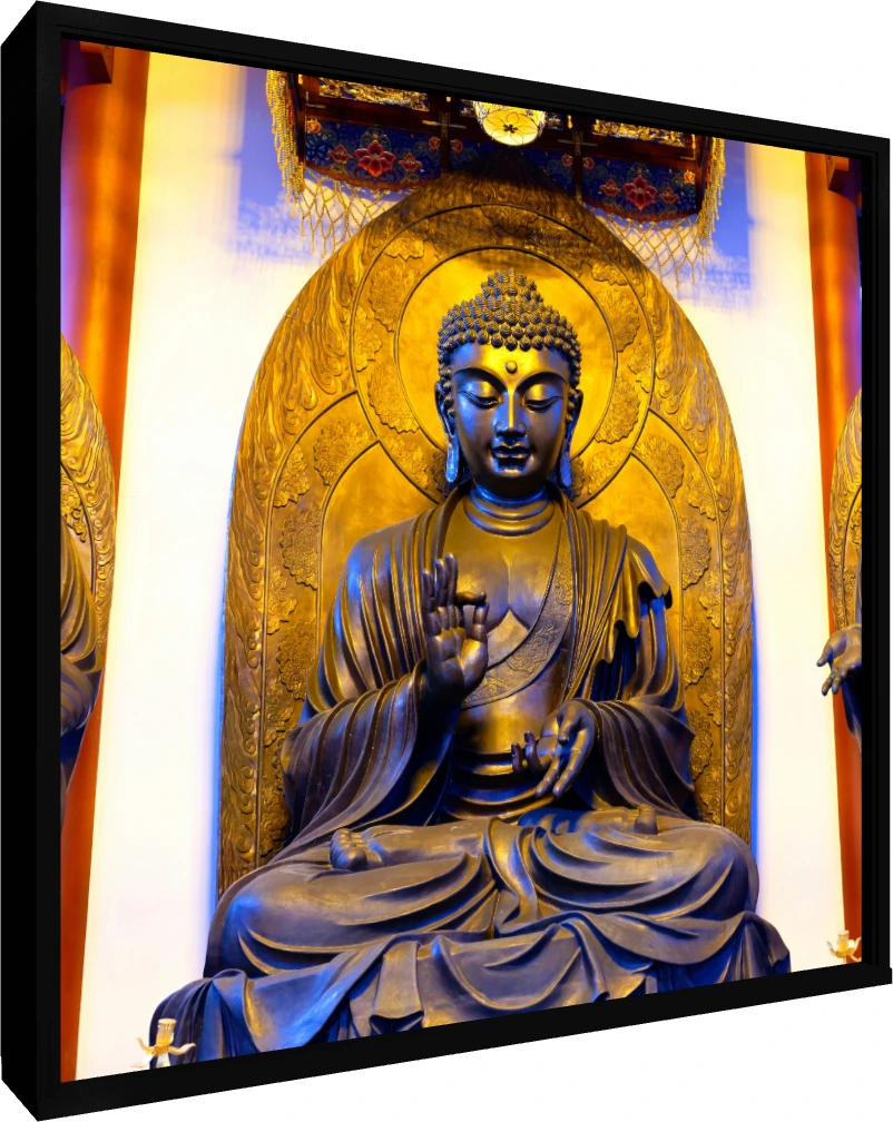 A majestic golden bronze statue of Gautama Buddha seated in meditation inside a temple shrine with warm overhead lighting. — floater frame preview | PrintPosters.in