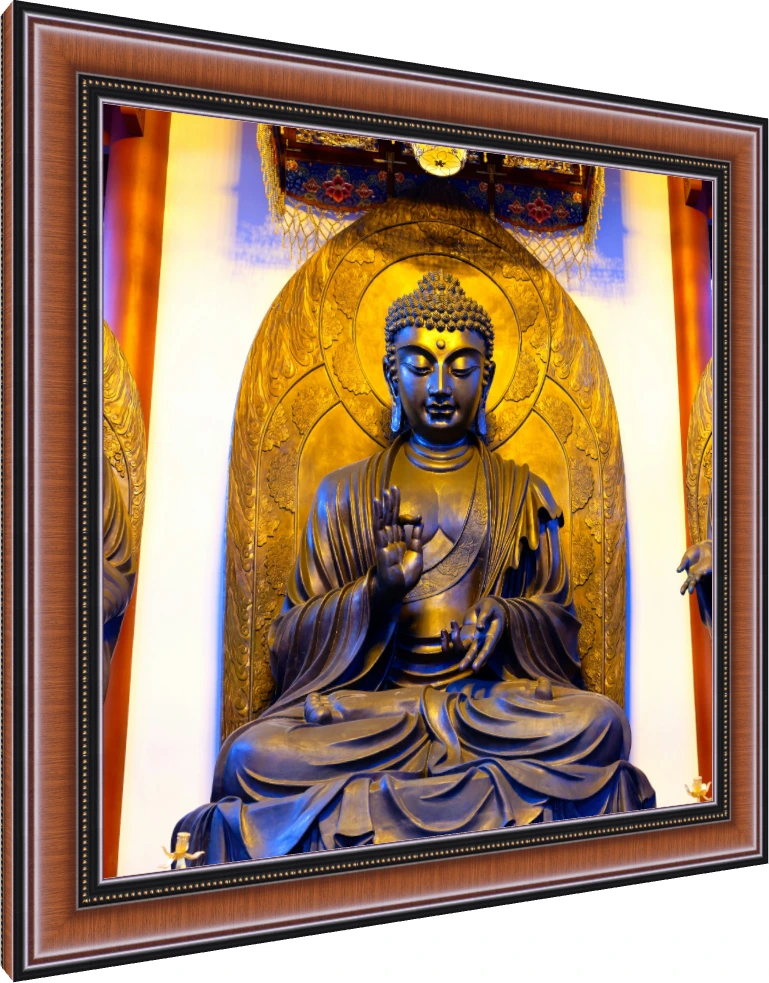 A majestic golden bronze statue of Gautama Buddha seated in meditation inside a temple shrine with warm overhead lighting. — photo frame preview | PrintPosters.in