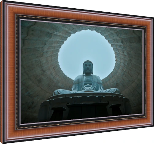 A low-angle photograph of a giant stone Lord Buddha statue framed by a circular concrete opening against a clear sky. — photo frame preview | PrintPosters.in