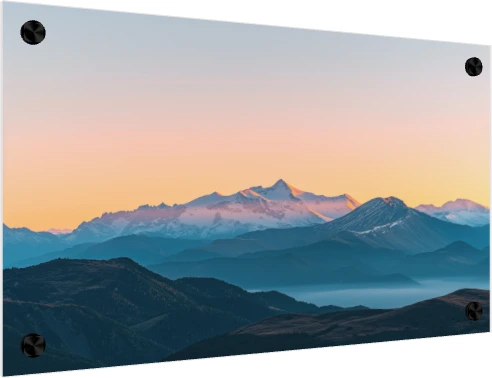 Panoramic view of majestic snow-capped mountain peaks illuminated by golden sunset light with misty blue ridges below. — acrylic preview | PrintPosters.in