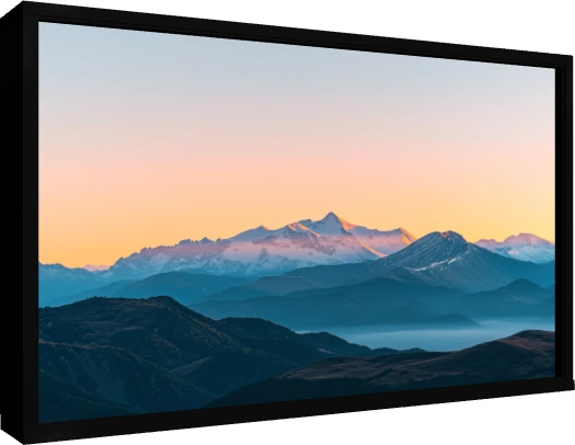 Panoramic view of majestic snow-capped mountain peaks illuminated by golden sunset light with misty blue ridges below. — floater frame preview | PrintPosters.in